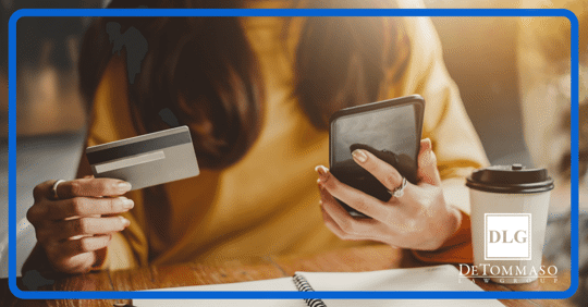 lady looking at credit card bills