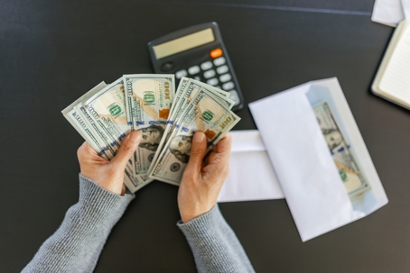 person budgeting money