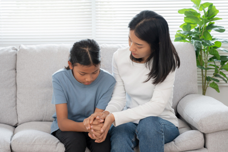 mother comforting child